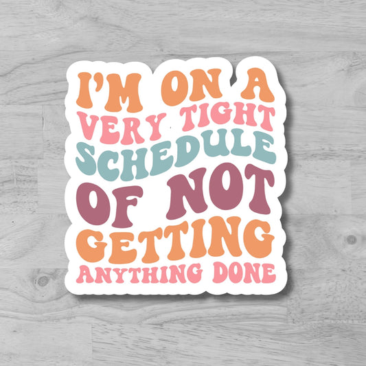 "I Am On A Very Tight Schedule Of Not Getting Anything Done" Glossy Vinyl Laminated Die-Cut Waterproof Sticker